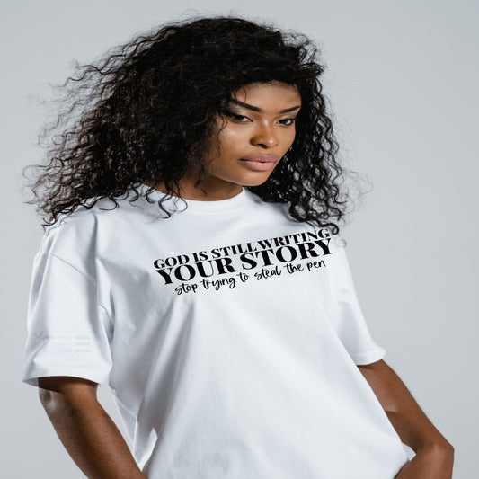 God is still writing your story tee