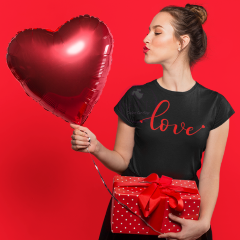 Black tee with love written in red letters with hearts